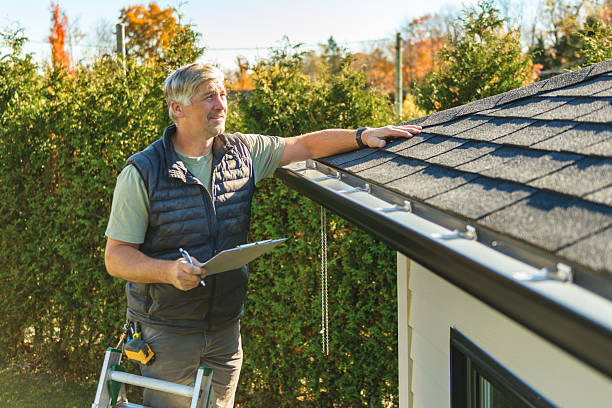 Professional Hail Damage Roof Repair technician working in Edgerton, OH
